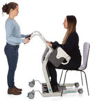 woman assisting woman with sit to stand
