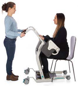 woman assisting woman with sit to stand