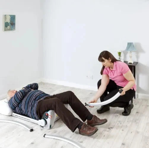man lying on floor on chair 