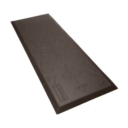 A dark brown rectangular floor mat with an embossed floral scroll pattern and a small 'PROBEK' brand label near one corner, shown on a plain white background.