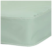 Light green fitted sheet corner on a white background