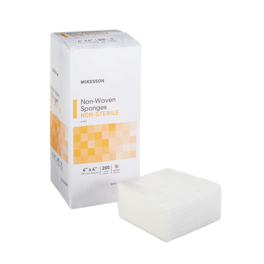 Box of McKesson non-woven sponges on a white background