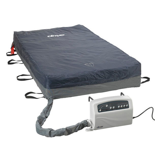 Gray air mattress with pump on a white background