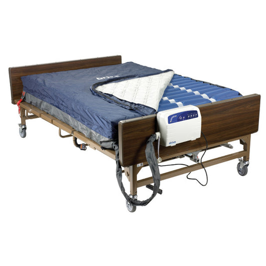 Hospital bed with air mattress and control panel on a white background