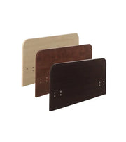 Three wooden boards of different colors on a white background