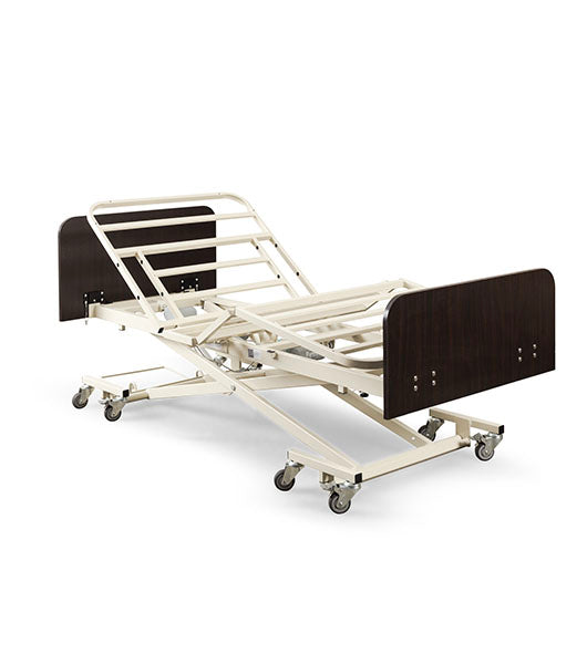 Electric hospital bed with adjustable features on a white background