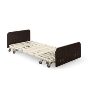 Bed frame with wooden head and footboards on a white background