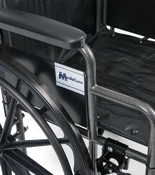 Black wheelchair with MedaCure logo on a white background
