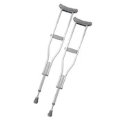 A pair of silver aluminum underarm crutches with gray pads and adjustable collars, shown against a plain white background.