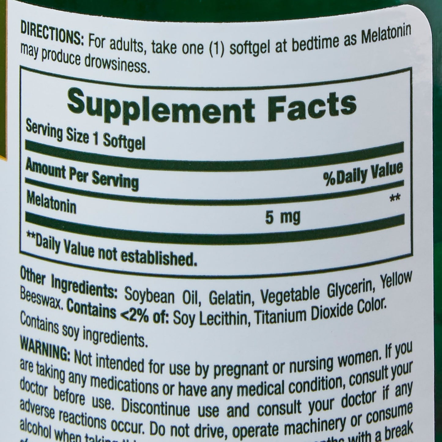 Supplement label with 'Melatonin' and 'Soybean Oil' listed as ingredients.