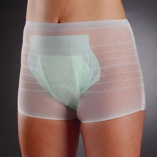 White mesh underwear with a green pad on a dark background
