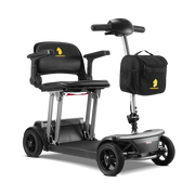 Black mobility scooter with a seat and bag on a white background