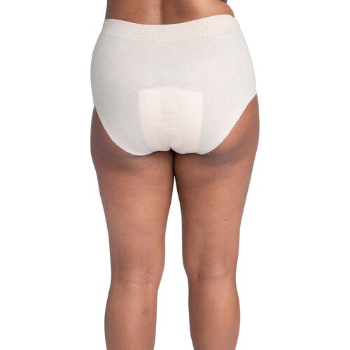 White incontinence pad worn by a person on a white background