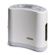 White and gray oxygen concentrator with digital display on a white background