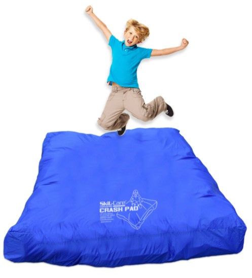 kid jumping on crash pad