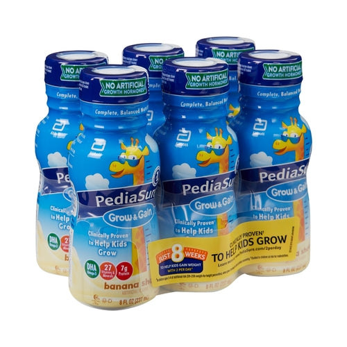Multiple bottles of PediaSure growth and development drink on a white background