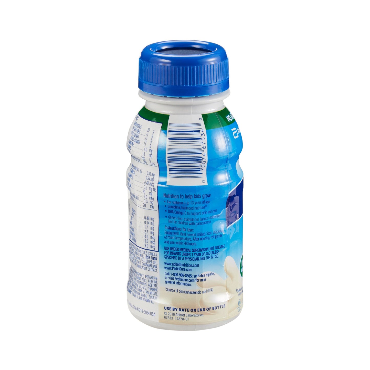 Bottle of milk with blue cap on a white background