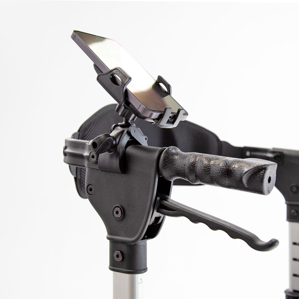 Close-up of a phone holder with a handle and reflective surface on a white background