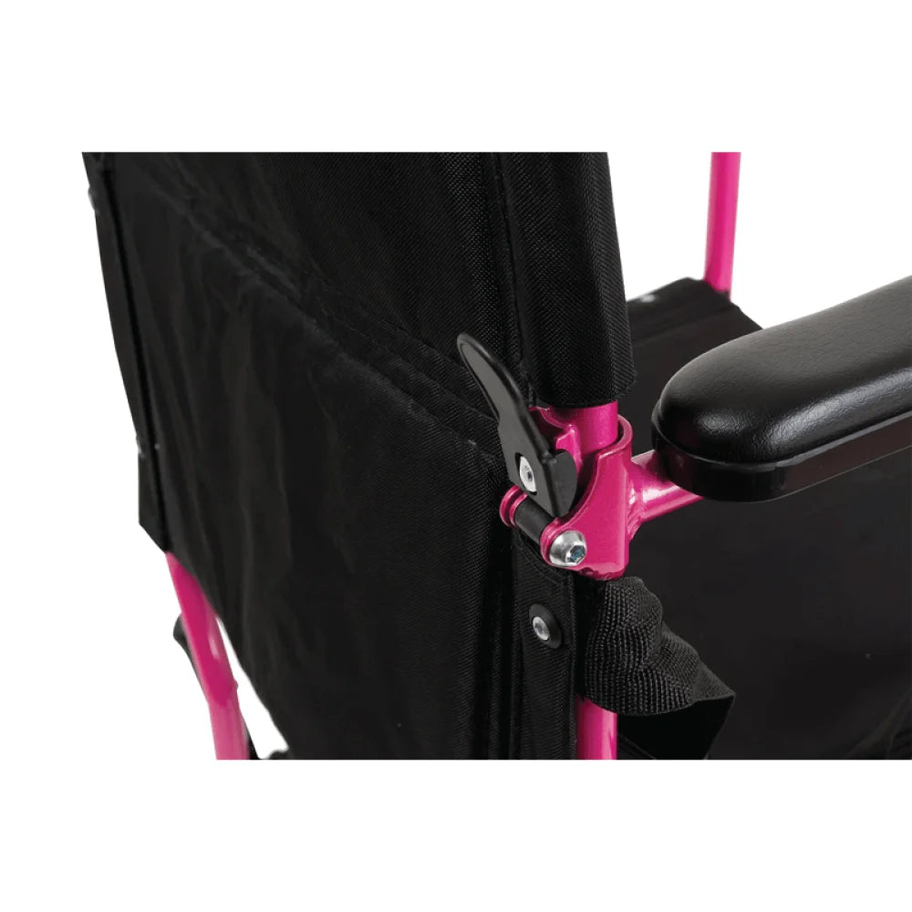 Close-up of a black stroller with pink handle and armrests on a white background
