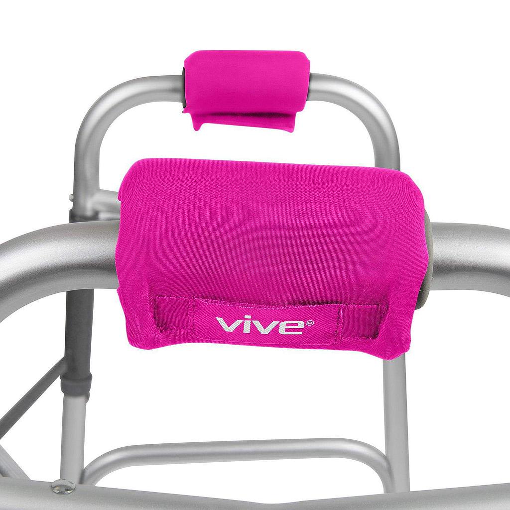Pink armrest covers with 'vive' branding on a walker.