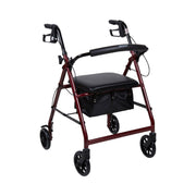Red rollator with black seat and wheels on a white background