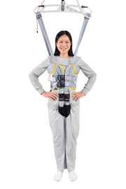 Person wearing a full-body harness on a white background