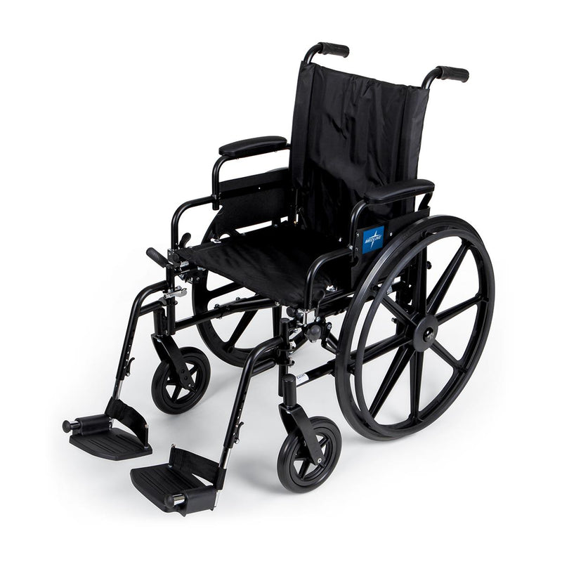 Black wheelchair with footrests on a white background