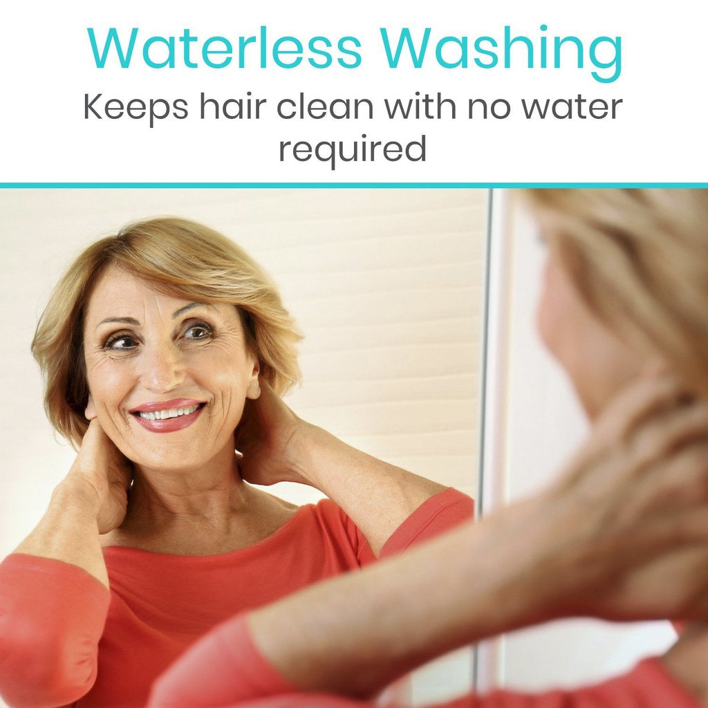Woman looking at herself in the mirror with text about waterless washing.