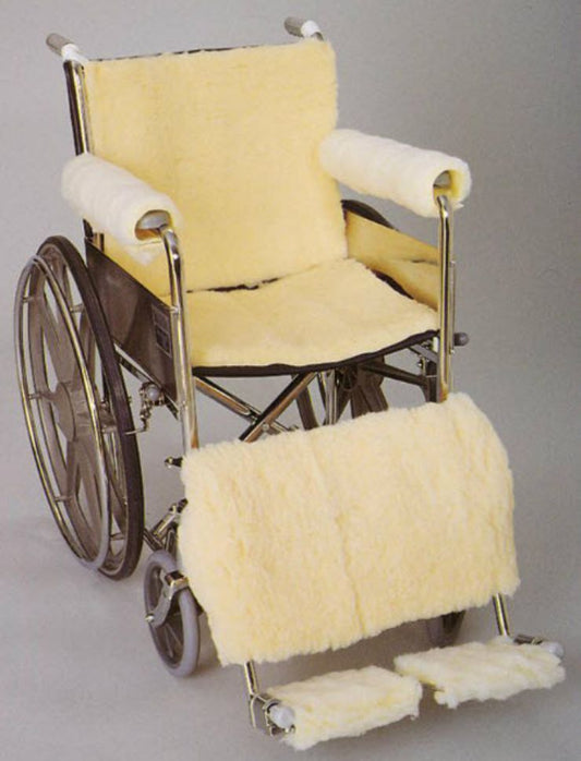 Wheelchair with sheepskin coverings on a gray background