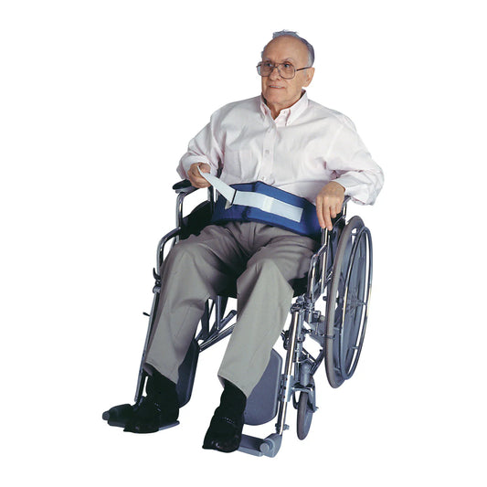 Man in a wheelchair with a safety belt on a white background