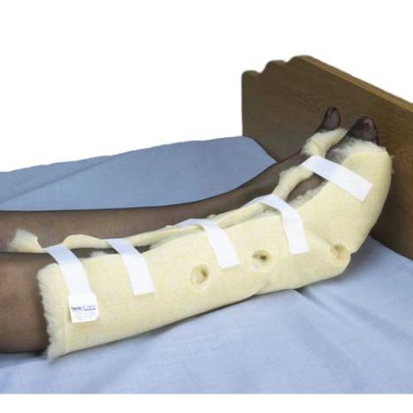 soft boot with bandages on a bed