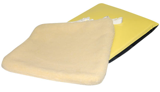 Yellow and beige cushion on a white background