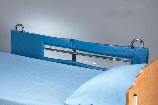 Blue bed safety rail attached to a hospital bed with a neutral background