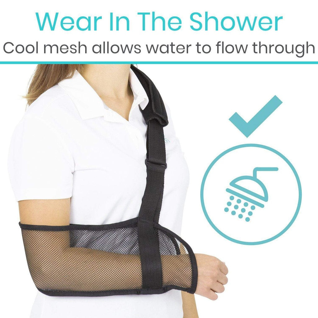 Black mesh arm sling worn by a person with text about its use in the shower.