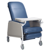 A blue and beige medical reclining chair with a white tray table and gray wheels, shown on a plain white background.