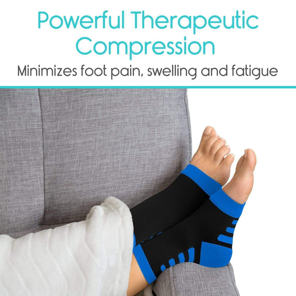 Person wearing a black and blue compression sock on a gray couch with text about therapeutic compression benefits.
