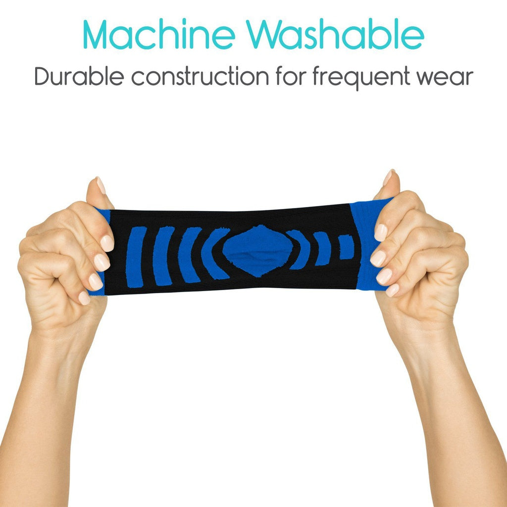 Blue and black fabric strip held by hands with text about machine washability on a white background