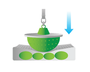 A green and white technical illustration showing a hanging green bowl-like component pressing into a white rectangular base with four green oval pads, plus a blue downward arrow on a dark green background.