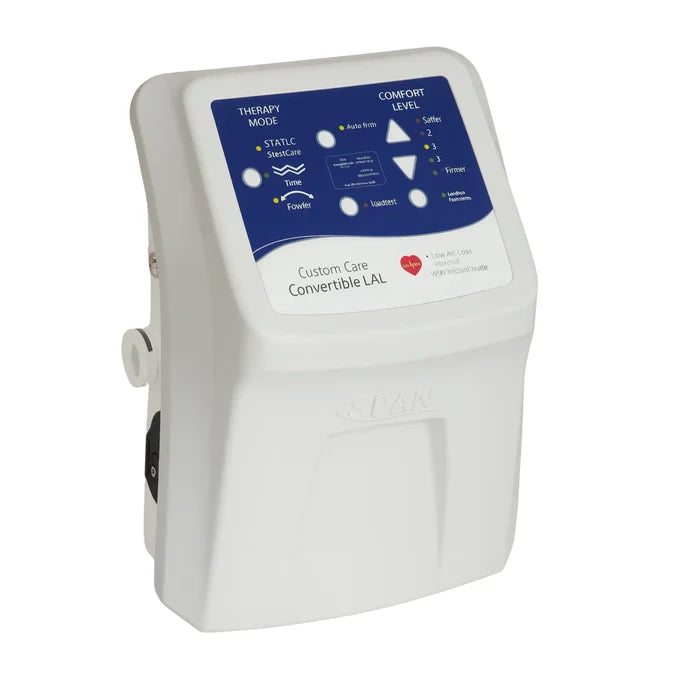 A white medical device labeled 'Custom Care Convertible LAL' with a blue control panel on the front, shown on a plain white background.