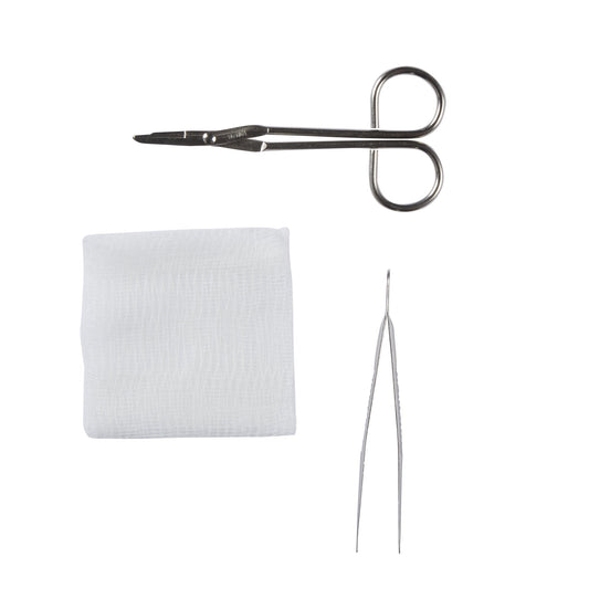 Scissors, bandage, and needle on a white background