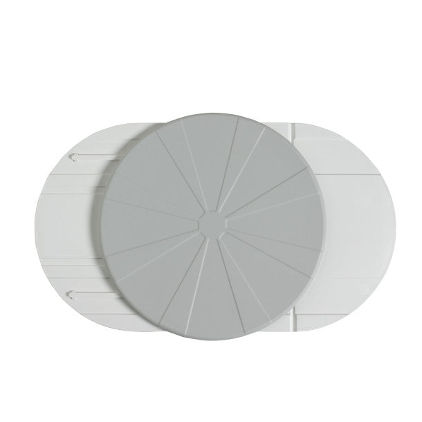 Round gray object with a central cutout on a white background