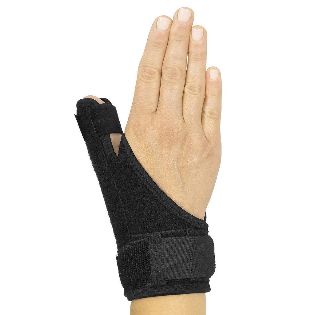 Black wrist support brace on a hand against a white background