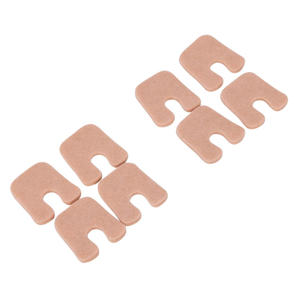 Set of six beige adhesive patches on a white background