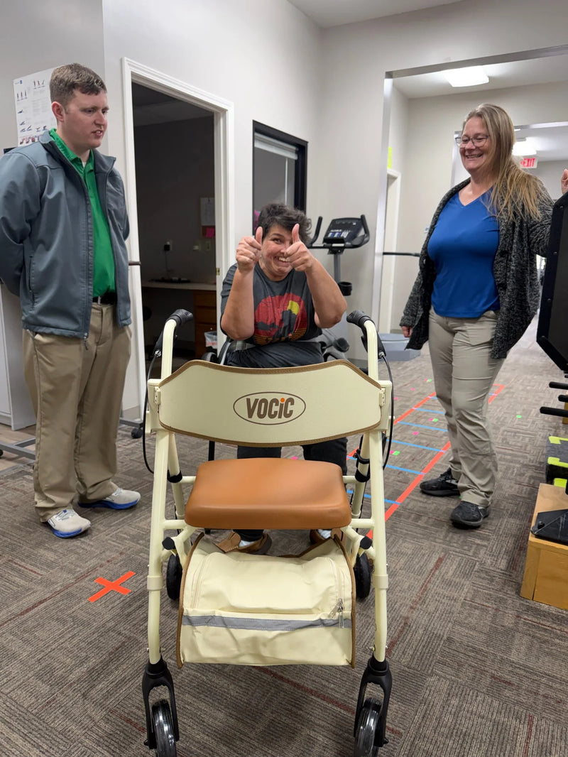 person in therapy using a rollator