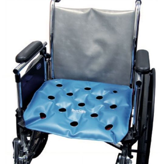 Wheelchair with a blue gel seat cushion on a white background