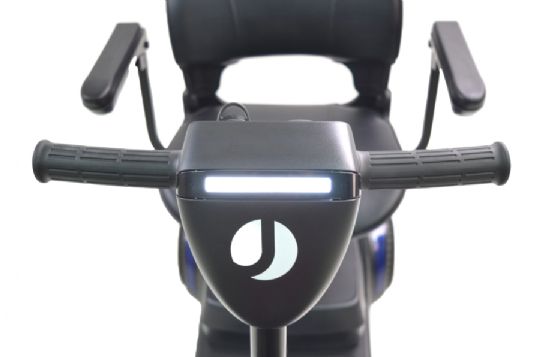 Close-up of a scooter handlebar with a logo on a white background