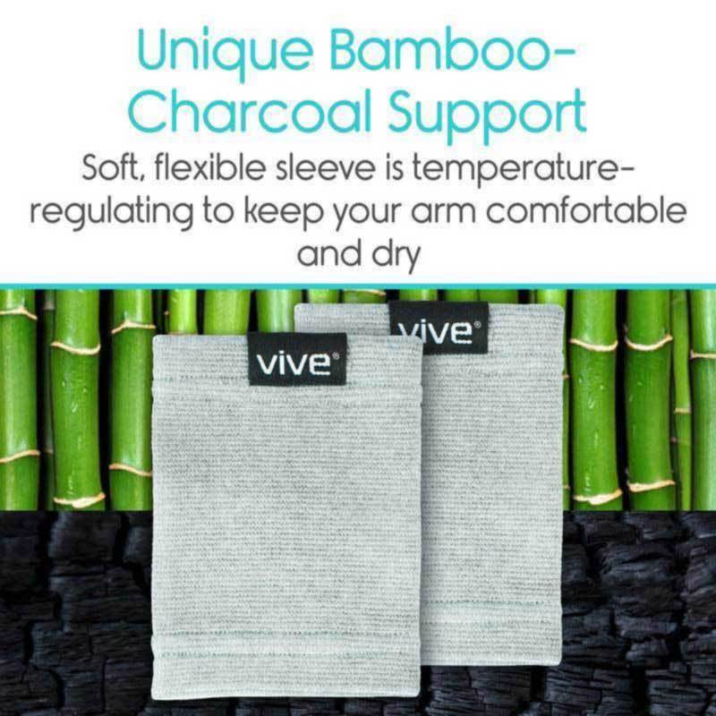 Two gray sleeves with 'vive' branding against a bamboo and charcoal background.