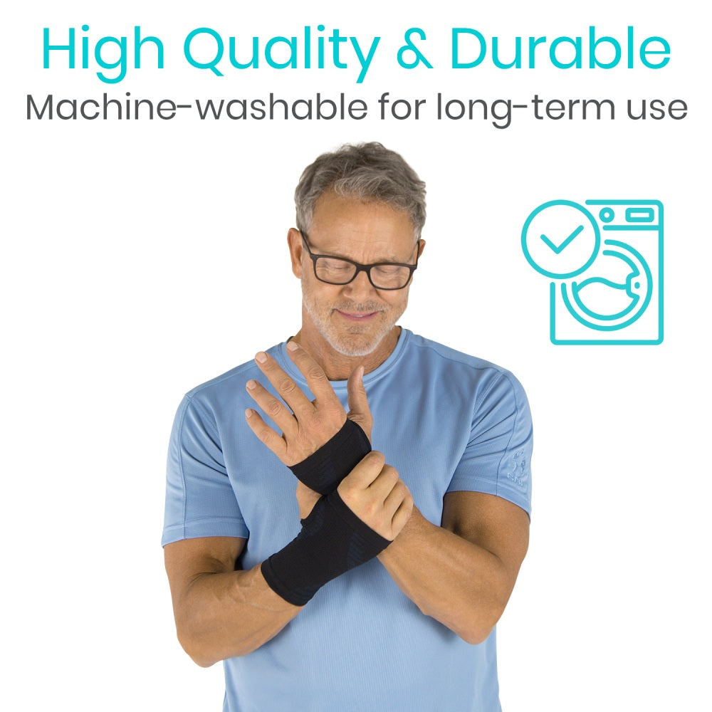 Man wearing a black wrist support with text about high quality, durability, and machine-washability.