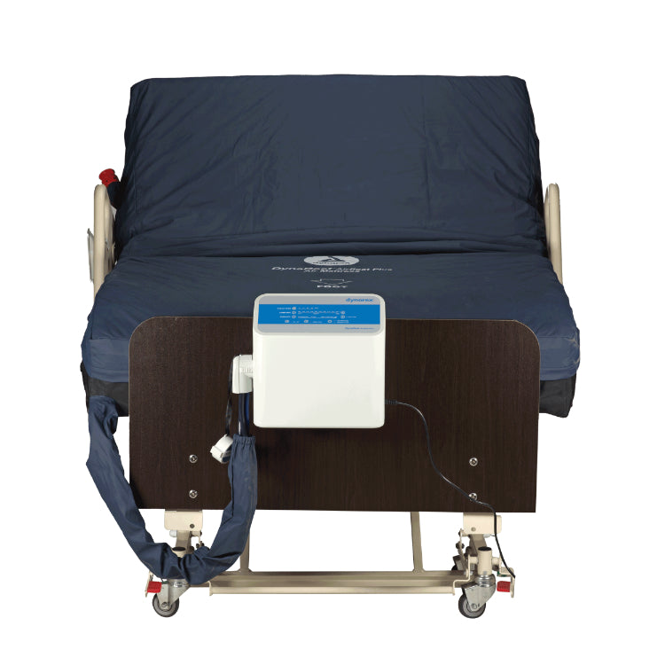 Medical bed with a device attached on a white background