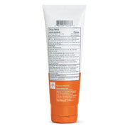 Back label of an orange and white tube on a white background